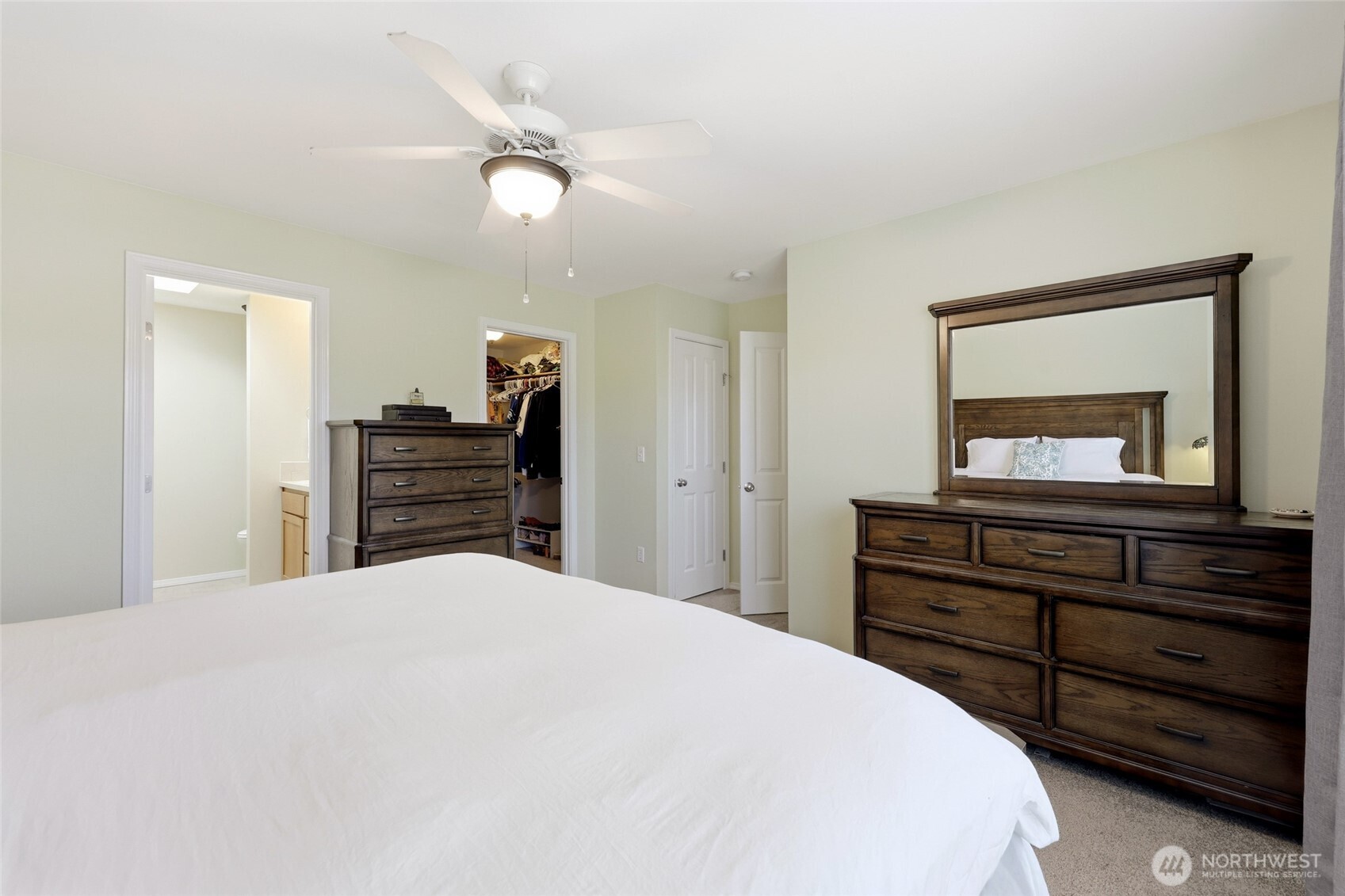 6914 Axis Street Southeast Lacey, WA 98513 - Photo 22 of 38 a bedroom with a bed and a dresser