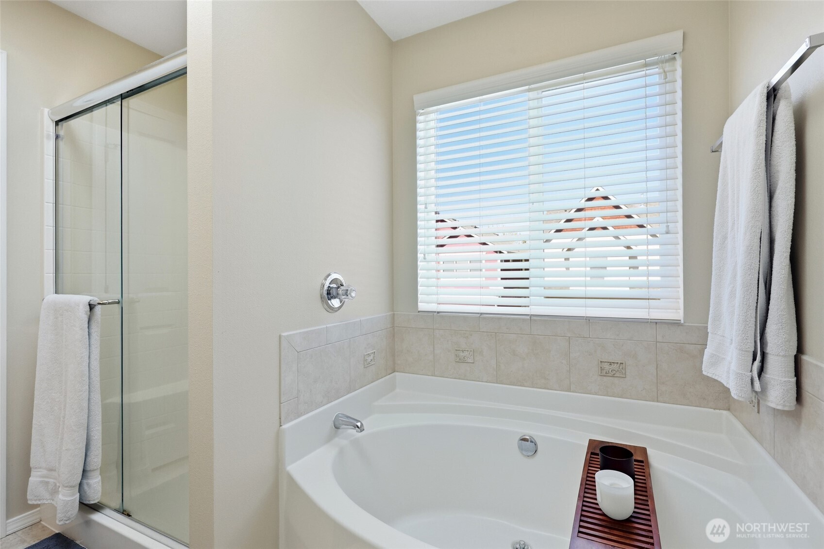 6914 Axis Street Southeast Lacey, WA 98513 - Photo 24 of 38 a bathroom with a tub and shower