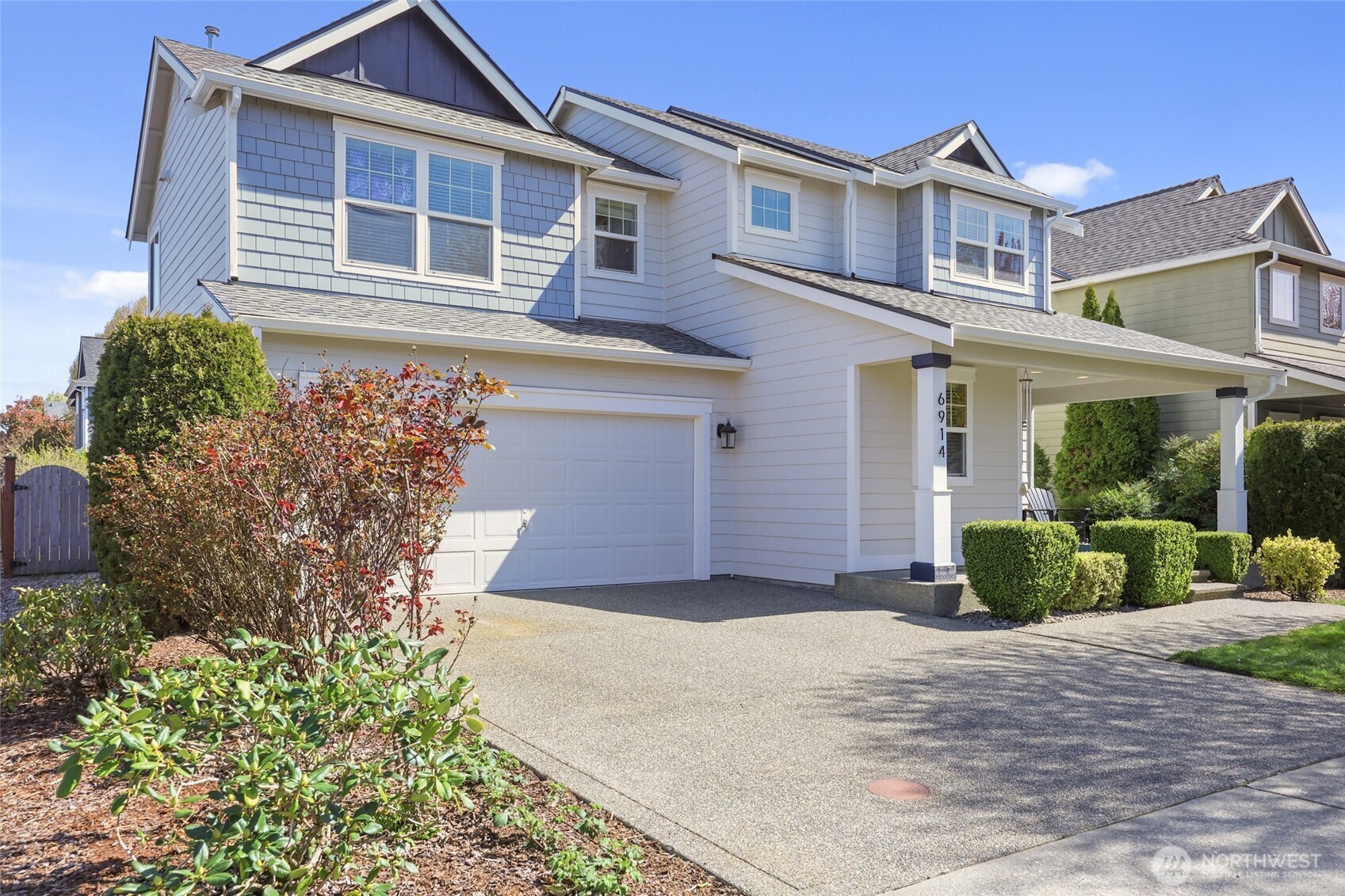 6914 Axis Street Southeast Lacey, WA 98513 - Photo 38 of 38 a front view of a house with garden