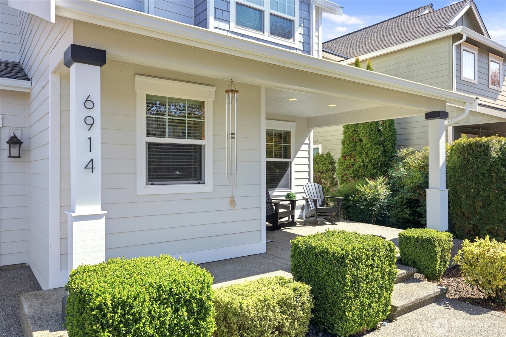 6914 Axis Street Southeast Lacey, WA 98513 - Photo 4 of 38 a front view of a house with garden