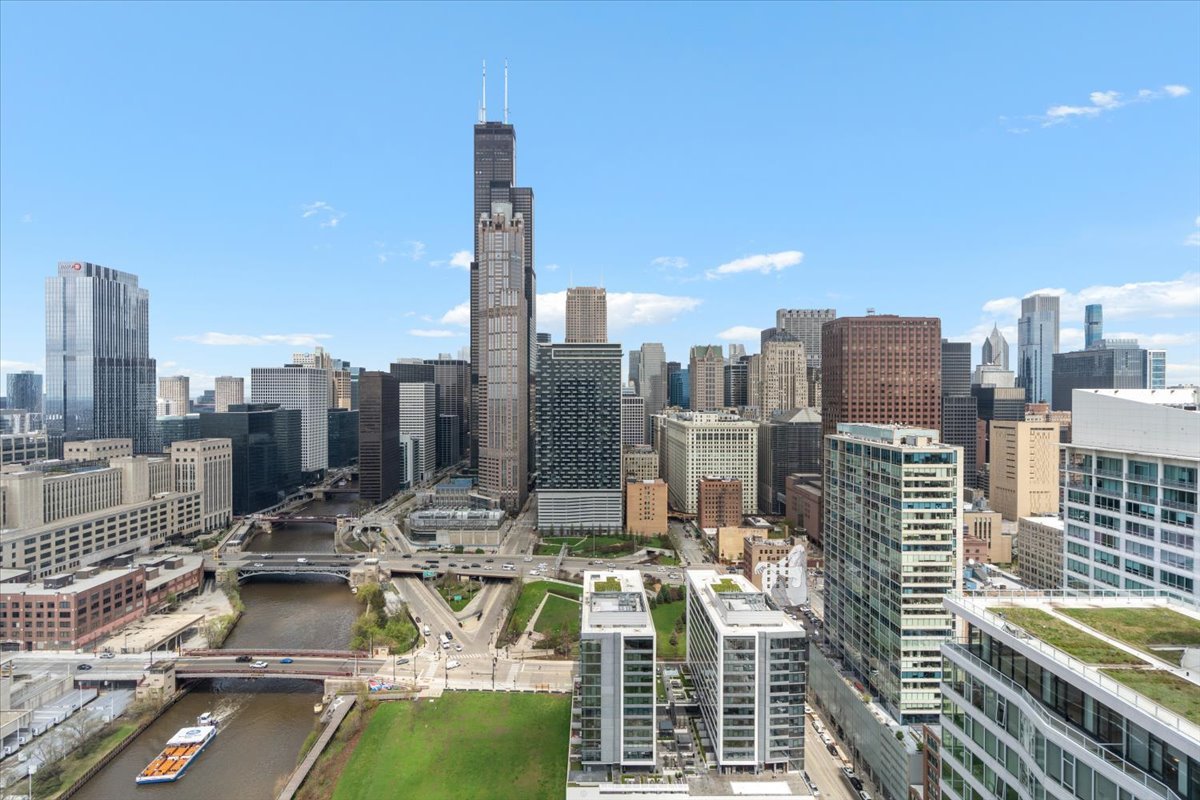 234 West Polk Street, Unit 3708 Chicago, IL 60607 - Photo 43 of 44 a view of city with tall buildings