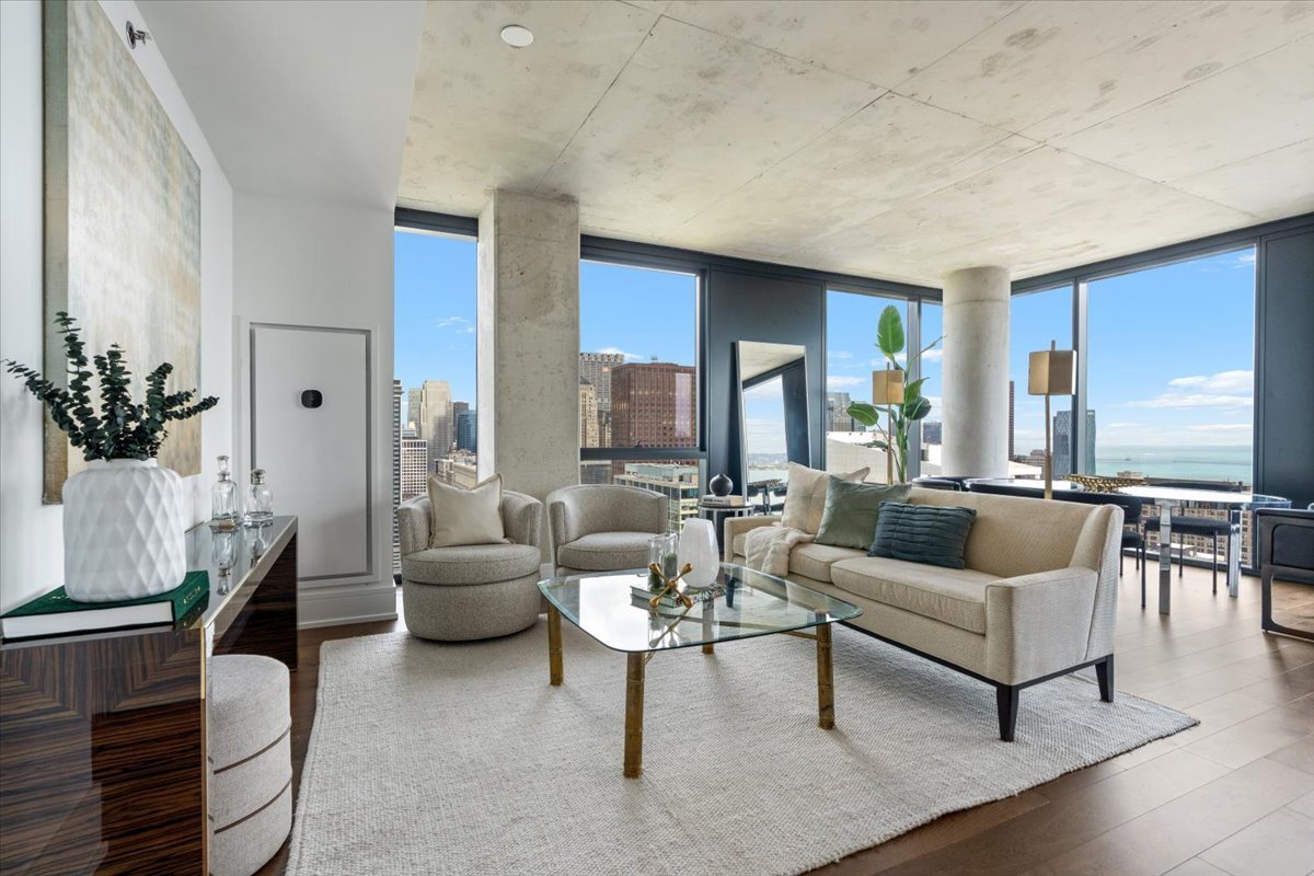 234 West Polk Street, Unit 3708 Chicago, IL 60607 - Photo 5 of 44 a living room with furniture and a large window