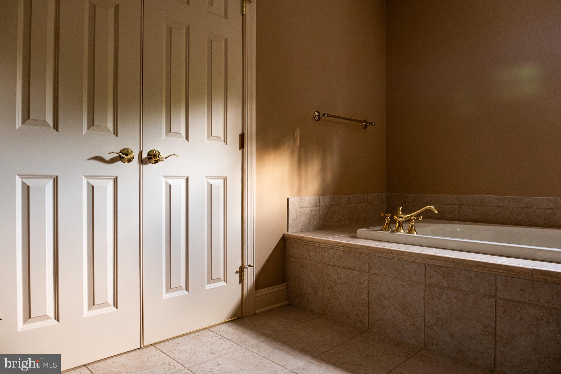 2 Garden Path, Unit 14 Doylestown, PA 18901 - Photo 22 of 36 Serene bathroom with elegant fixtures.
