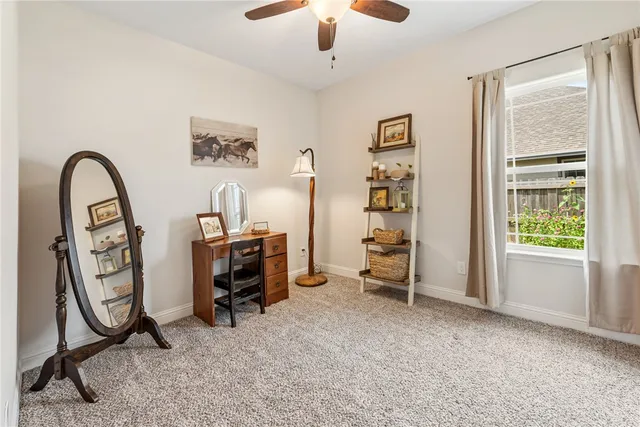 a view of a workspace with furniture