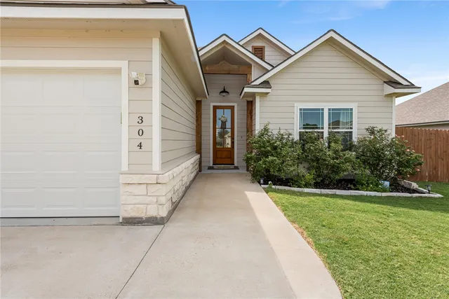 a view of a house with garden