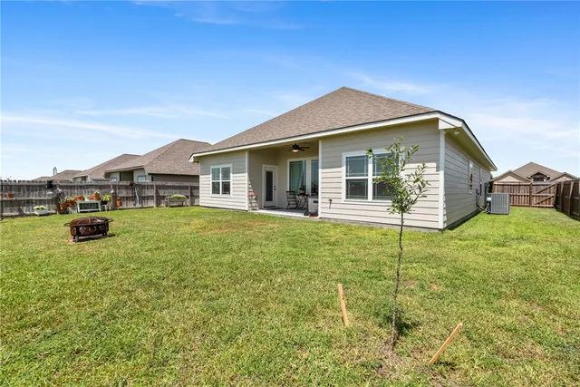 a house view with a garden space