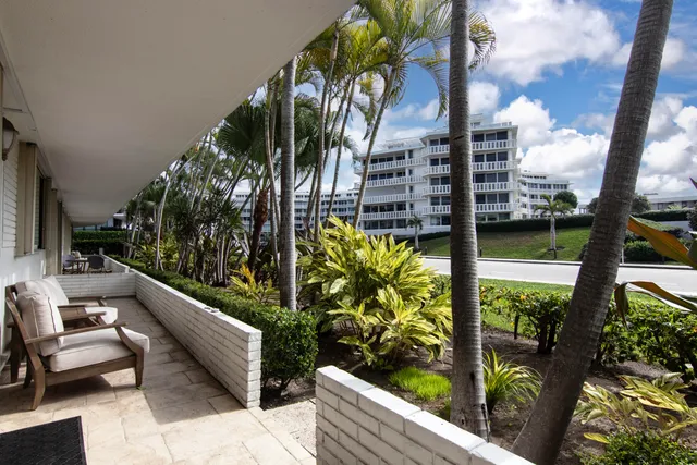 a view of balcony with a potted plant
