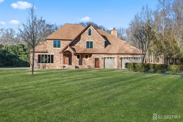 a spacious bedroom with a bed and window