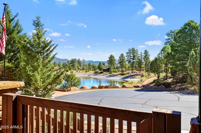 a view of balcony with wooden floor