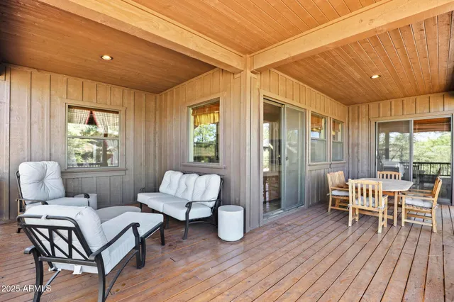 a view of a two chairs in the roof deck