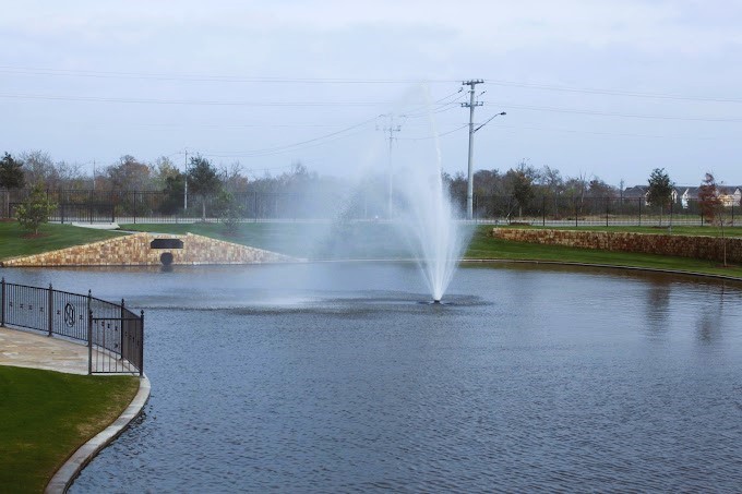 1198 Jones-Butler Road, Unit 2707 College Station, TX 77840 - Photo 17 of 24 a view of a lake with houses