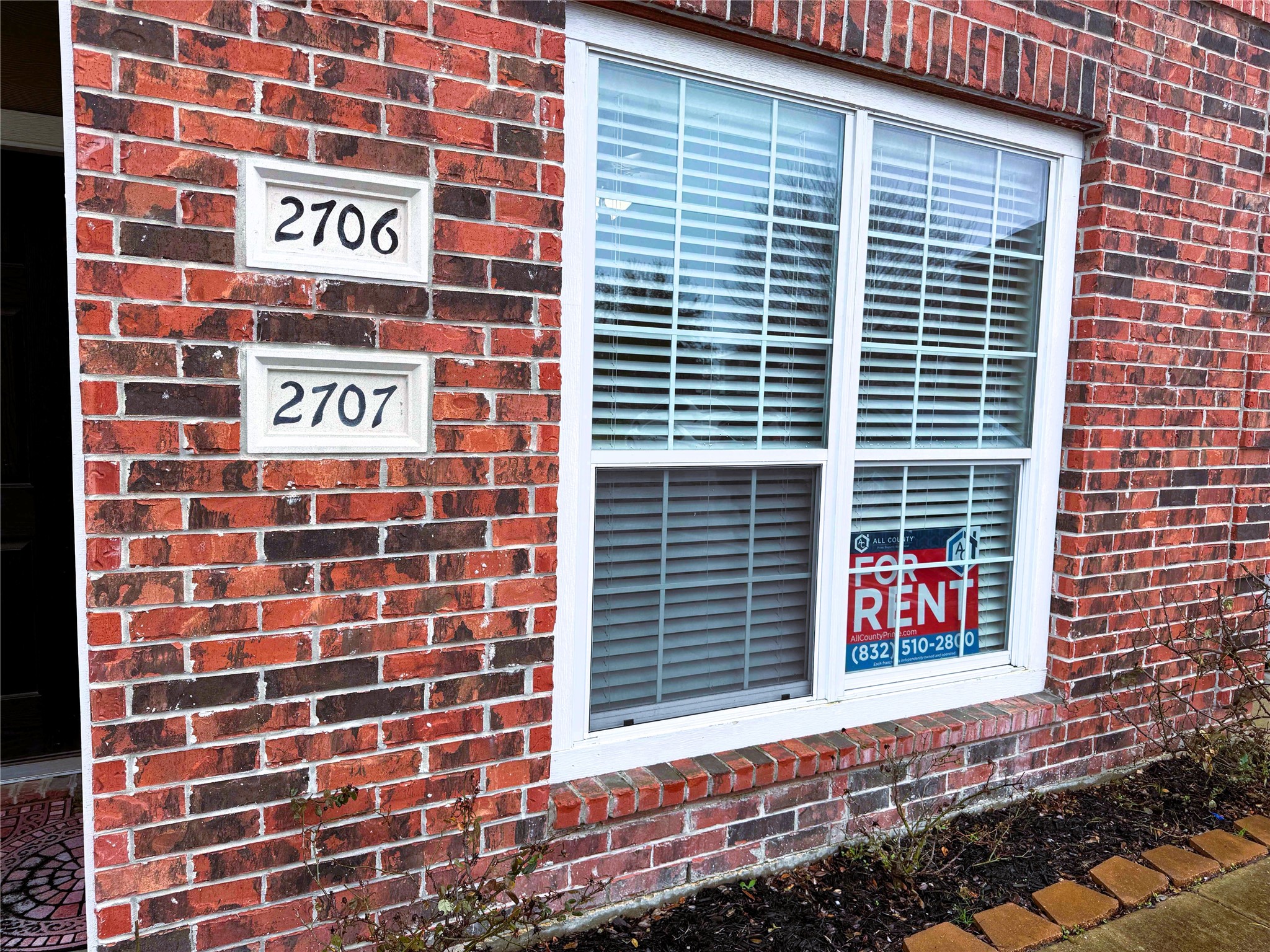 1198 Jones-Butler Road, Unit 2707 College Station, TX 77840 - Photo 2 of 24 a view of a brick building with many windows