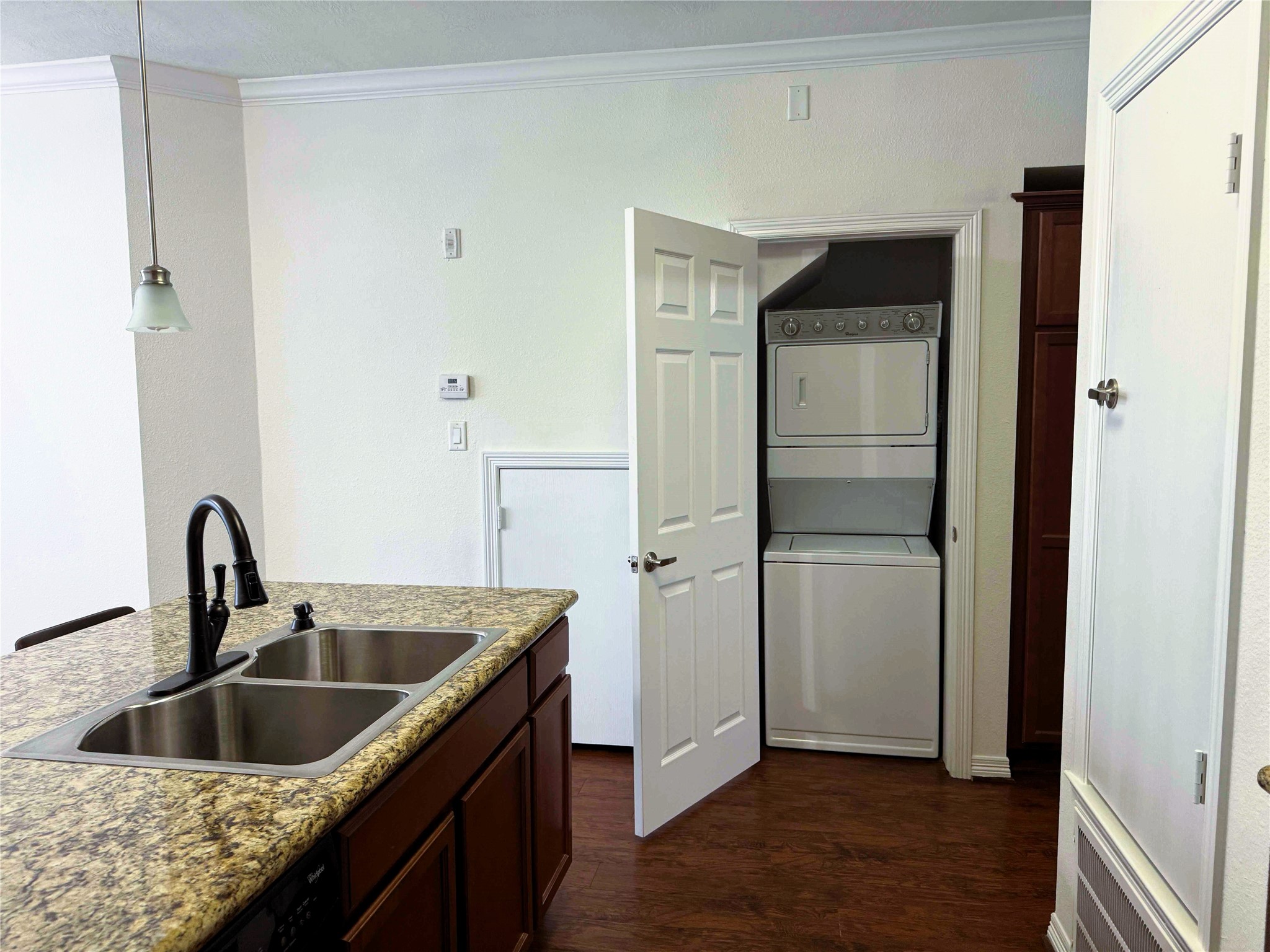 1198 Jones-Butler Road, Unit 2707 College Station, TX 77840 - Photo 9 of 24 a kitchen with a refrigerator and sink