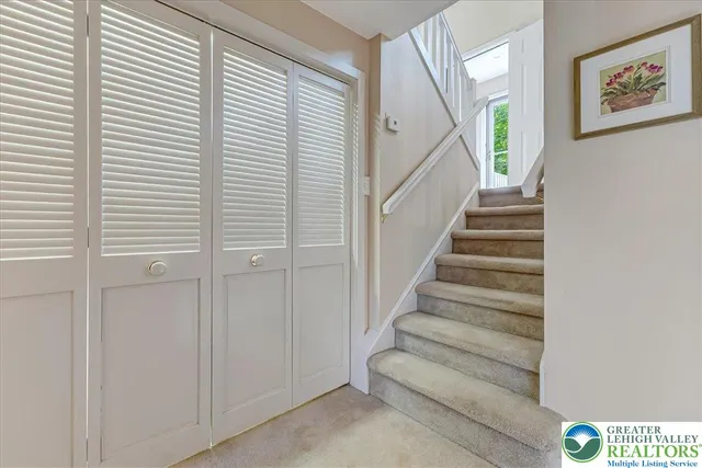 a view of entryway with stairs