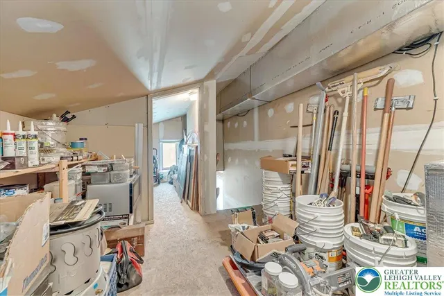 a aerial view of a house with a yard