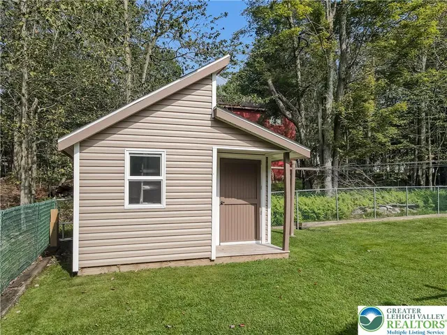 a view of an chairs and table in the balcony