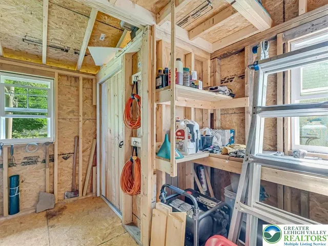 a view of back yard of the house and green space