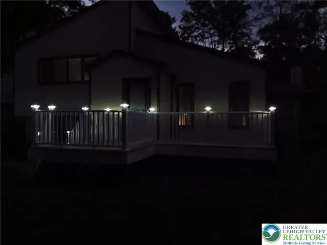 an aerial view of residential house with outdoor space