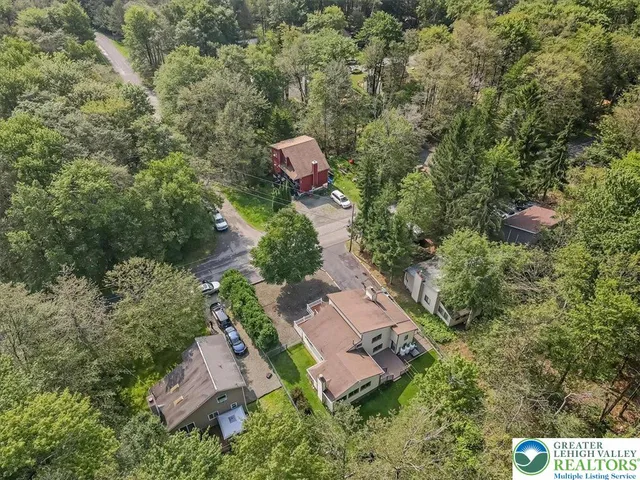 a view of a house with pool porch and furniture
