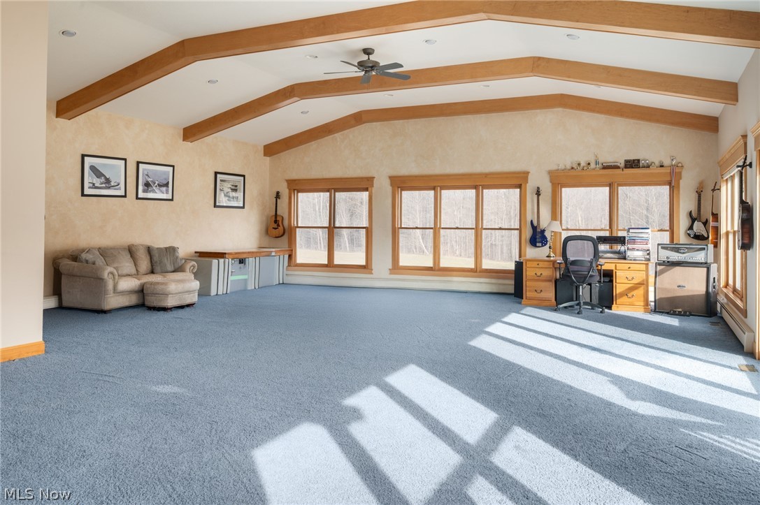 9419 Robinson Road Chardon, OH 44024 - Photo 27 of 46 Family room/bonus room with carpet flooring, a desk, beamed ceiling, recessed lighting, and a ceiling fan