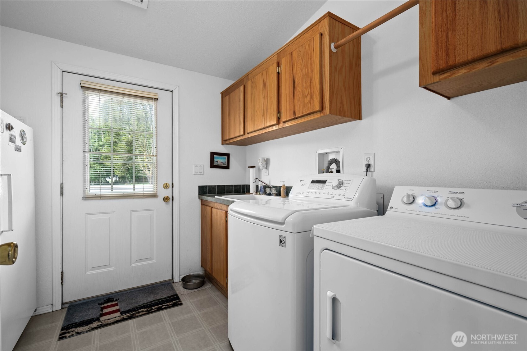155 Airport Perimeter Way Decatur Island, WA 98221 - Photo 21 of 26 a utility room with dryer and washer