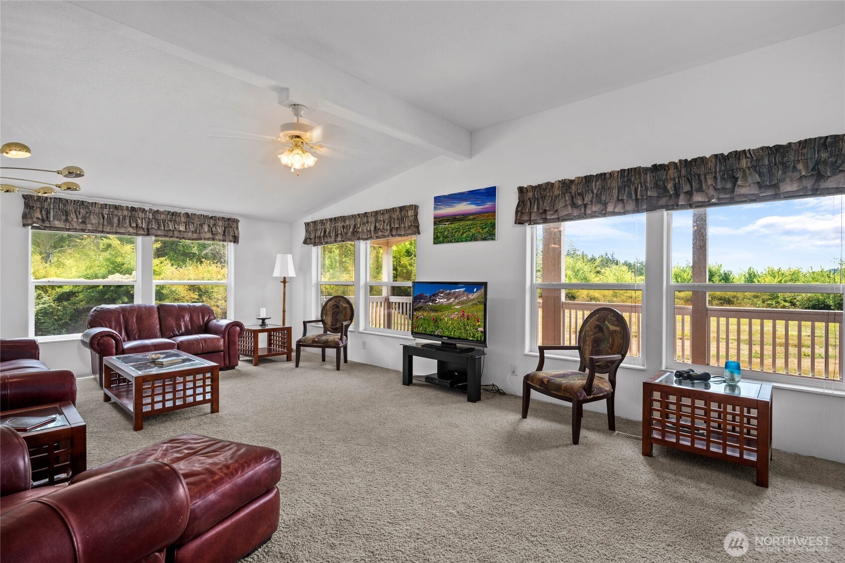 155 Airport Perimeter Way Decatur Island, WA 98221 - Photo 7 of 26 a living room with furniture and a flat screen tv