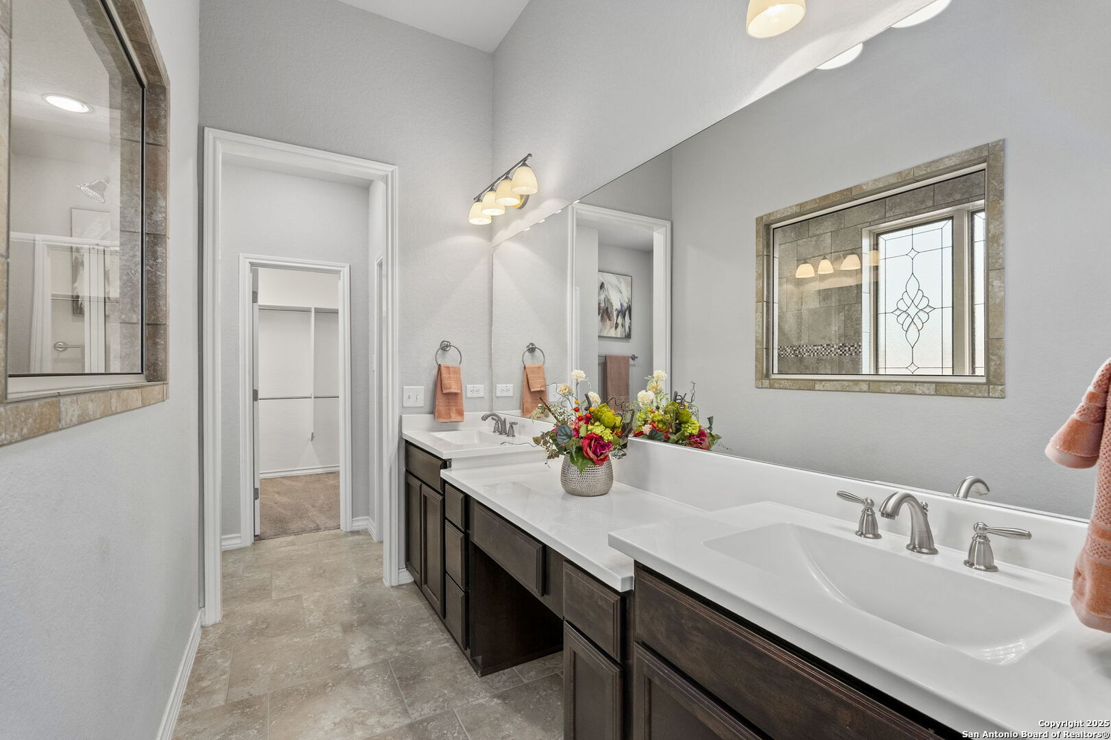 9753 Monken Boerne, TX 78006 - Photo 15 of 38 a bathroom with a sink double vanity granite and a mirror