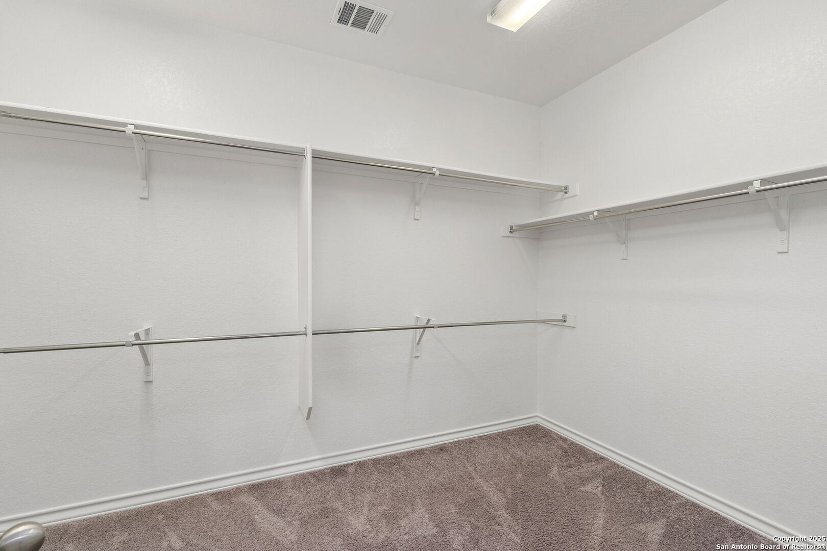 9753 Monken Boerne, TX 78006 - Photo 17 of 38 a view of an empty walk in closet