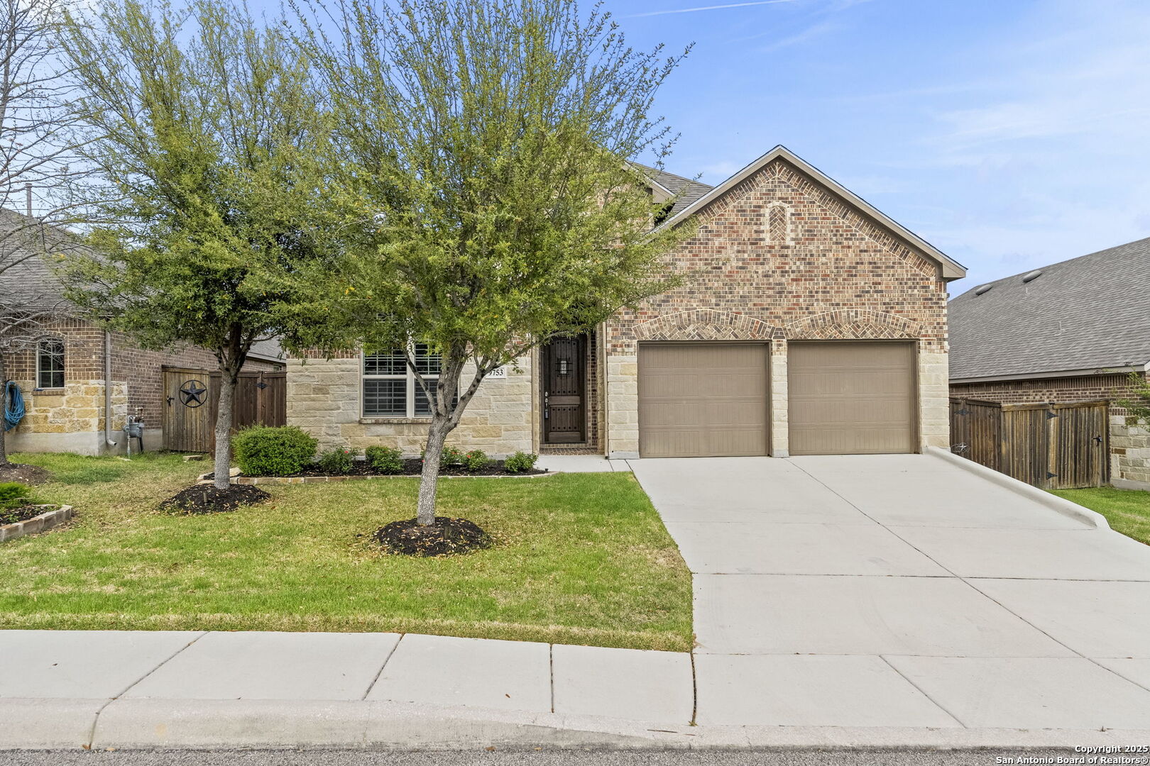 9753 Monken Boerne, TX 78006 - Photo 34 of 38 front view of a house with a yard