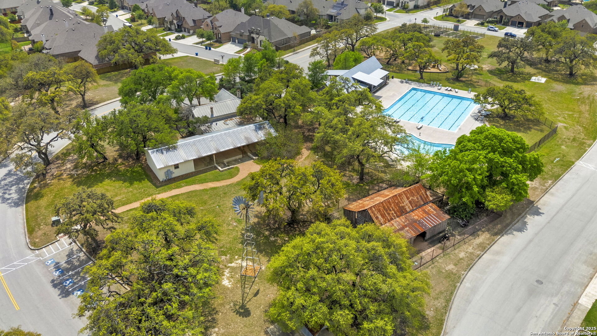 9753 Monken Boerne, TX 78006 - Photo 35 of 38 an aerial view of residential house with swimming pool and lawn chairs