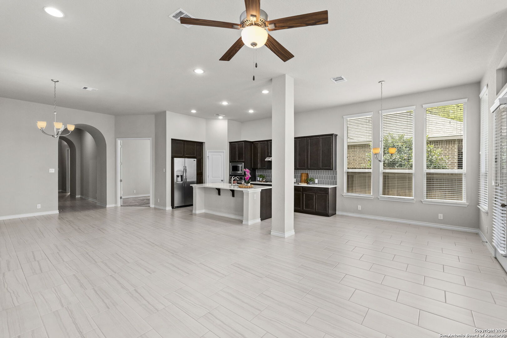 9753 Monken Boerne, TX 78006 - Photo 6 of 38 a view of a kitchen with microwave and refrigerator