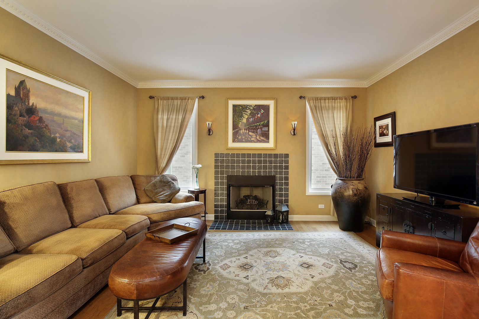 78 Ronan Road Highwood, IL 60040 - Photo 13 of 27 a living room with furniture and a flat screen tv