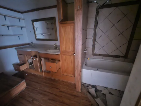 a view of entryway with wooden floor
