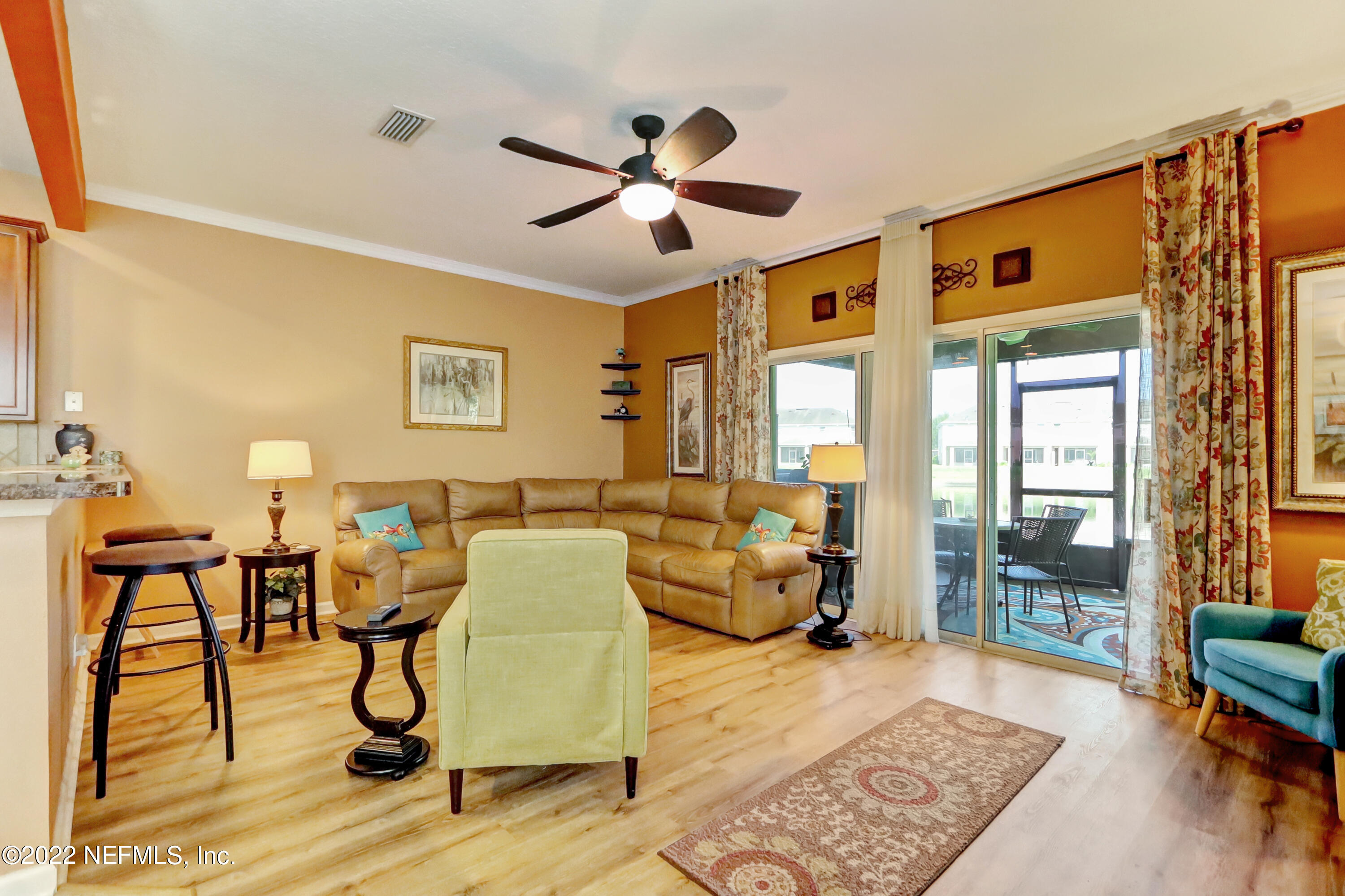 12952 Spring Rain Road Jacksonville, FL 32258 - Photo 14 of 28 a living room with furniture and a window
