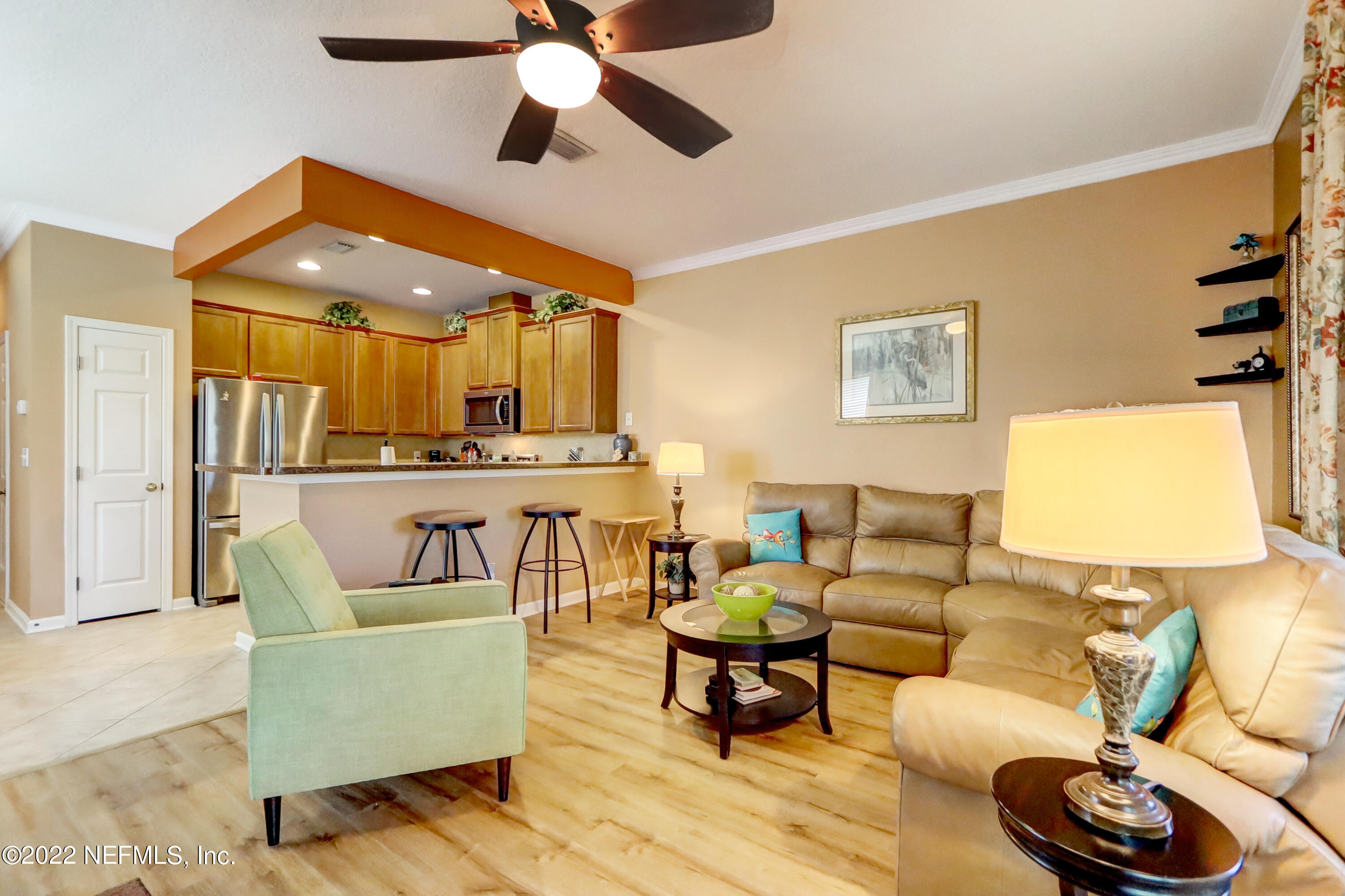 12952 Spring Rain Road Jacksonville, FL 32258 - Photo 15 of 28 a living room with furniture and a large window