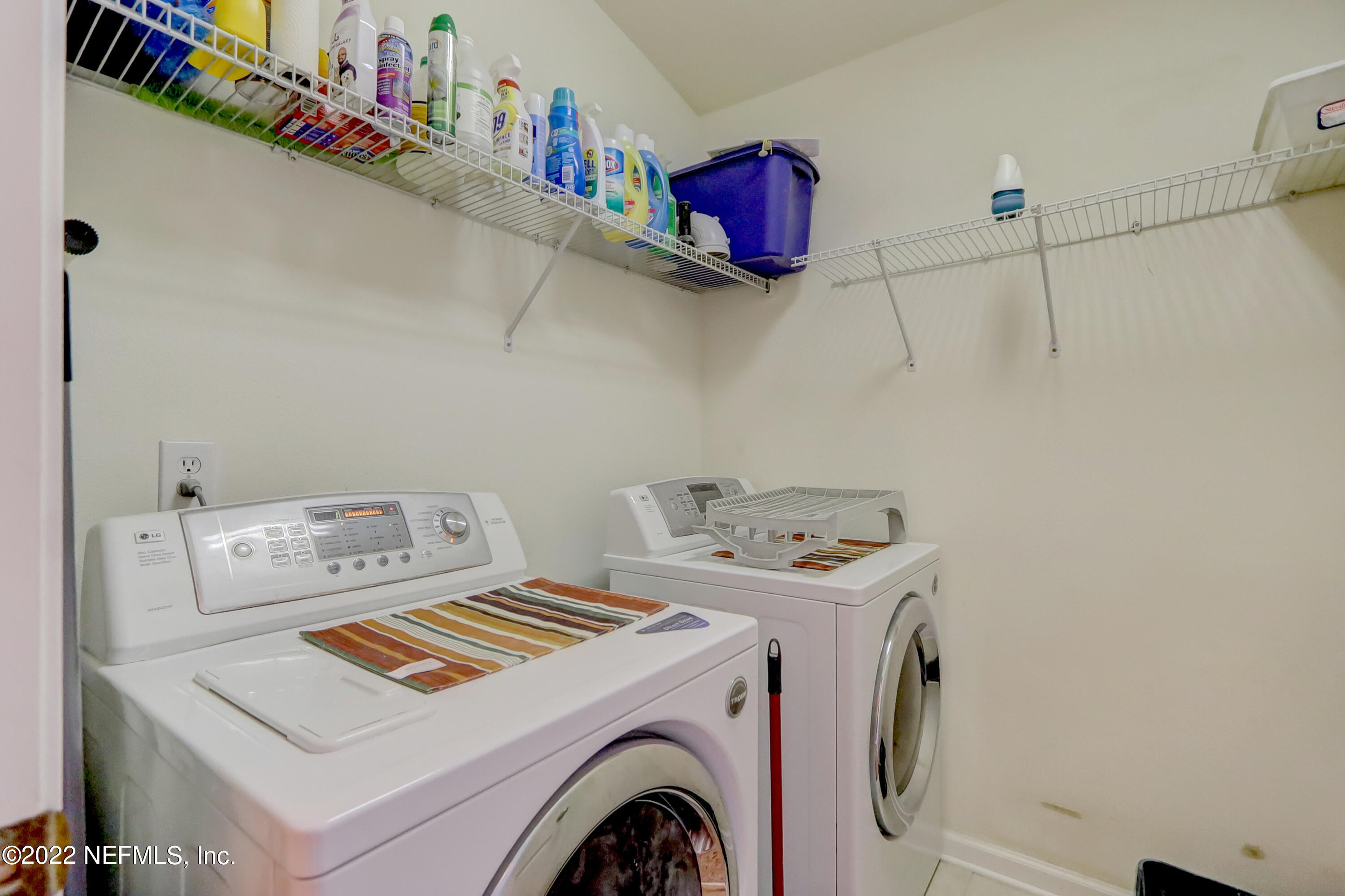 12952 Spring Rain Road Jacksonville, FL 32258 - Photo 19 of 28 a utility room with dryer and washer