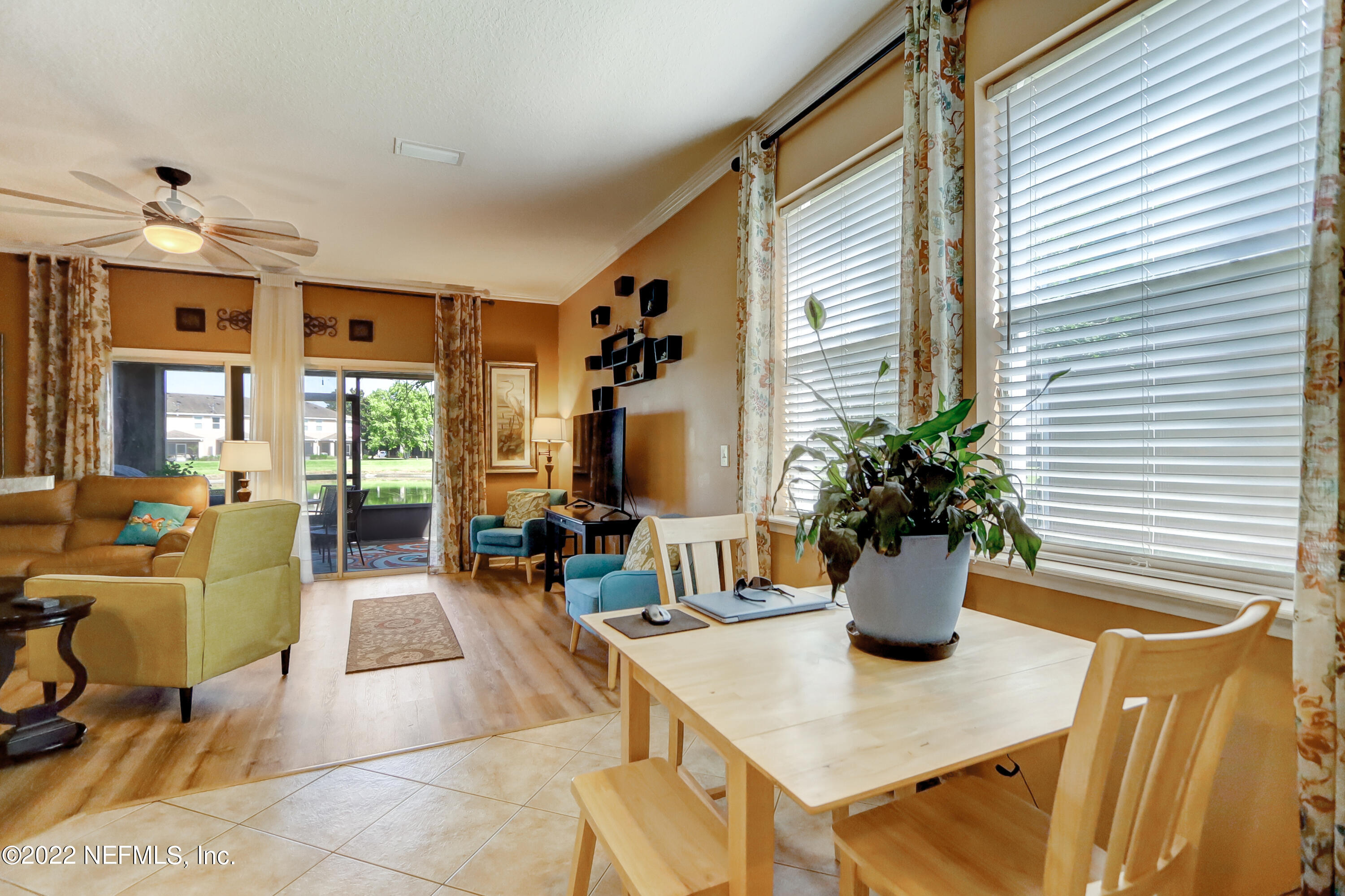 12952 Spring Rain Road Jacksonville, FL 32258 - Photo 7 of 28 a view of dining room and livingroom with furniture