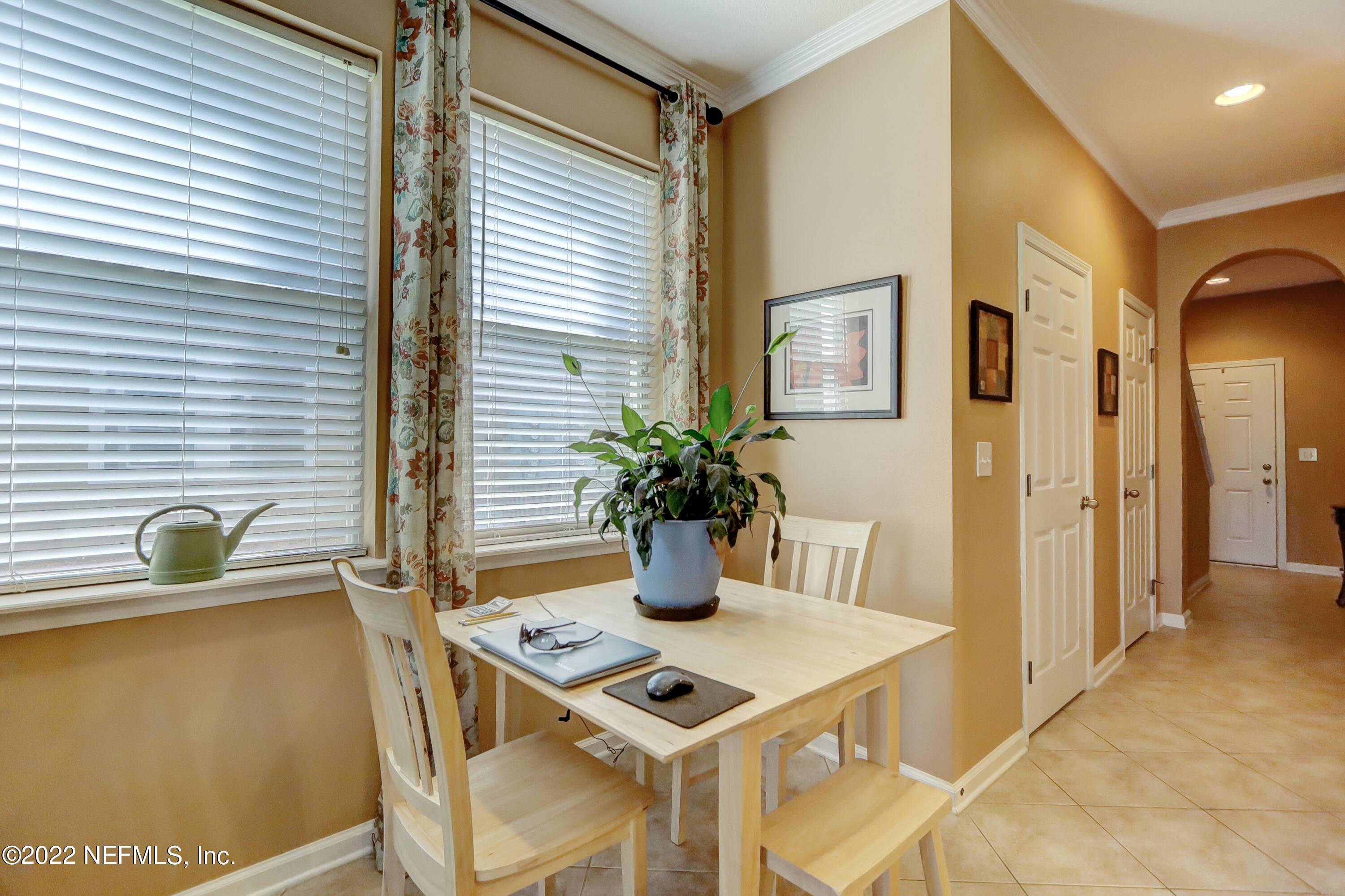 12952 Spring Rain Road Jacksonville, FL 32258 - Photo 9 of 28 a view of a workspace with furniture and window