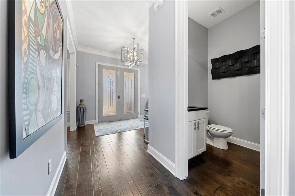 3165 Oakdale Road Atlanta, GA 30354 - Photo 15 of 35 a bathroom with a toilet a sink and mirror