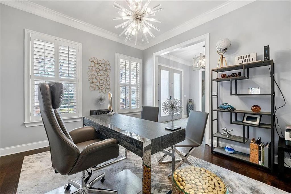 3165 Oakdale Road Atlanta, GA 30354 - Photo 16 of 35 a living room with furniture a flat screen tv and a floor to ceiling window