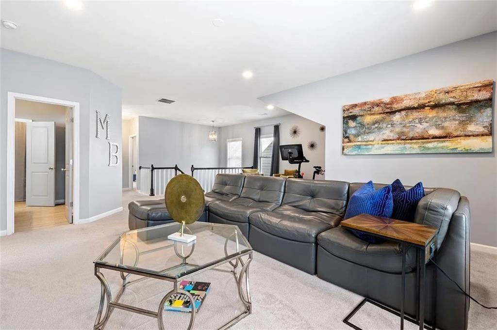 3165 Oakdale Road Atlanta, GA 30354 - Photo 17 of 35 a living room with furniture and painting on the wall