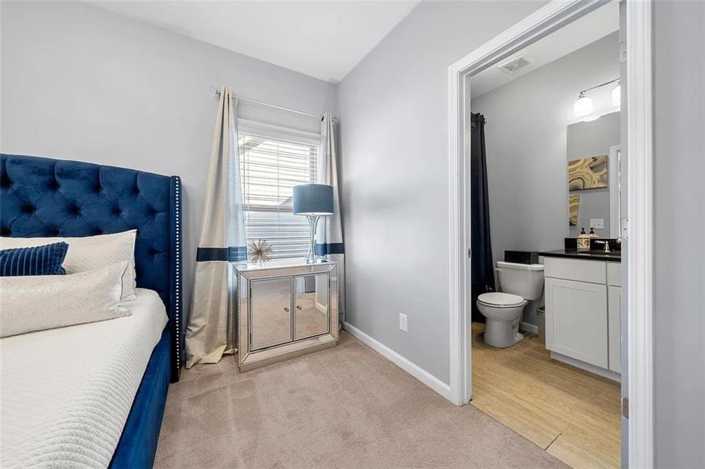 3165 Oakdale Road Atlanta, GA 30354 - Photo 27 of 35 a room with a bed and a view of bathroom