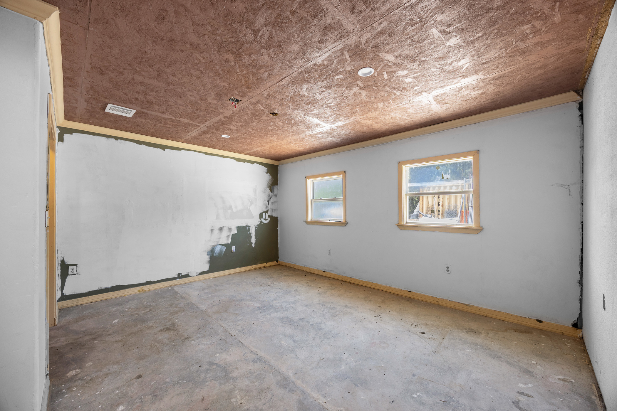 147 Community Center Road Rosanky, TX 78953 - Photo 26 of 33 Spare room with unfinished concrete floors and ornamental molding