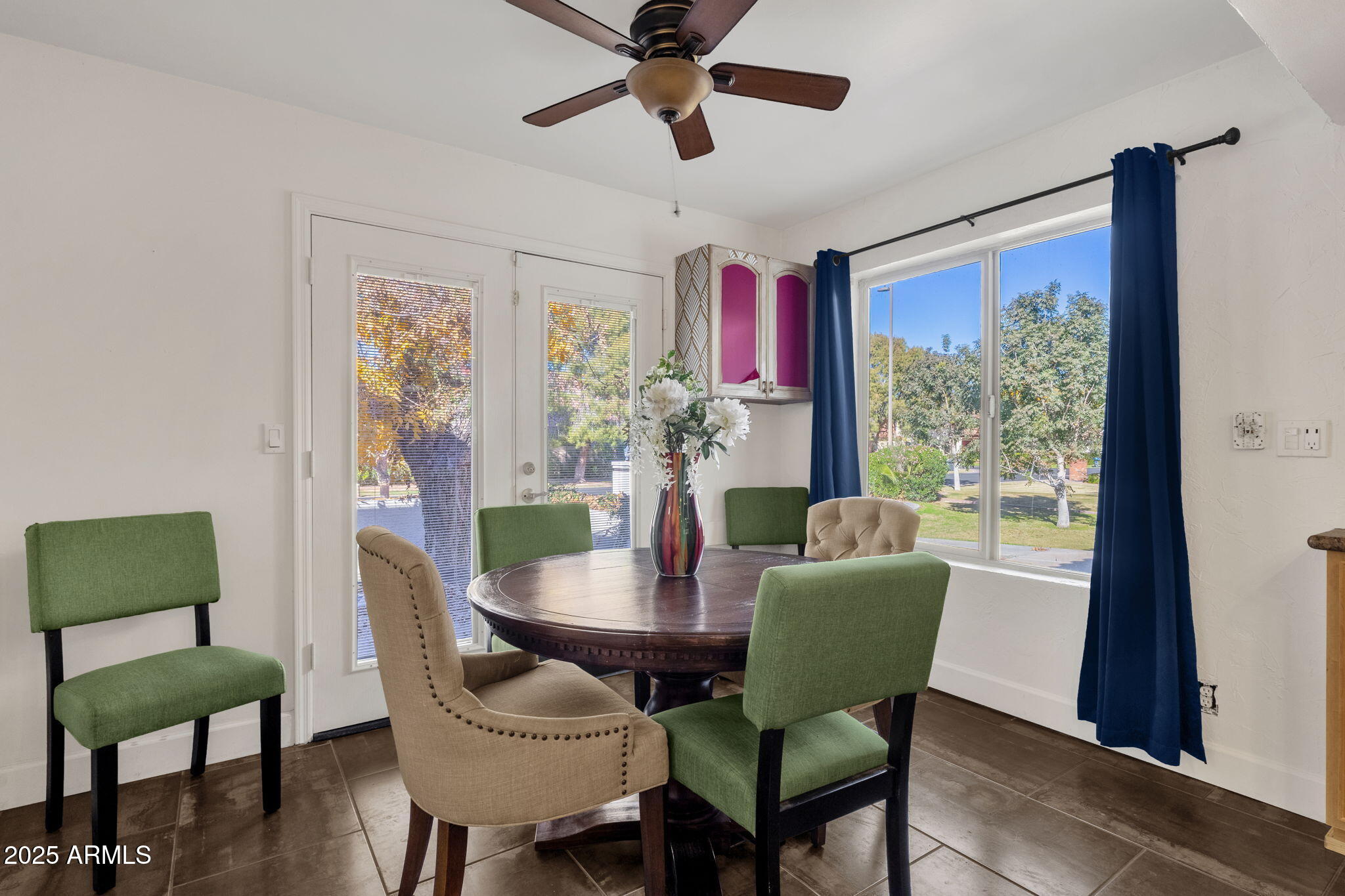 89 North Riata Street Gilbert, AZ 85234 - Photo 16 of 40 a dining room with furniture and a window