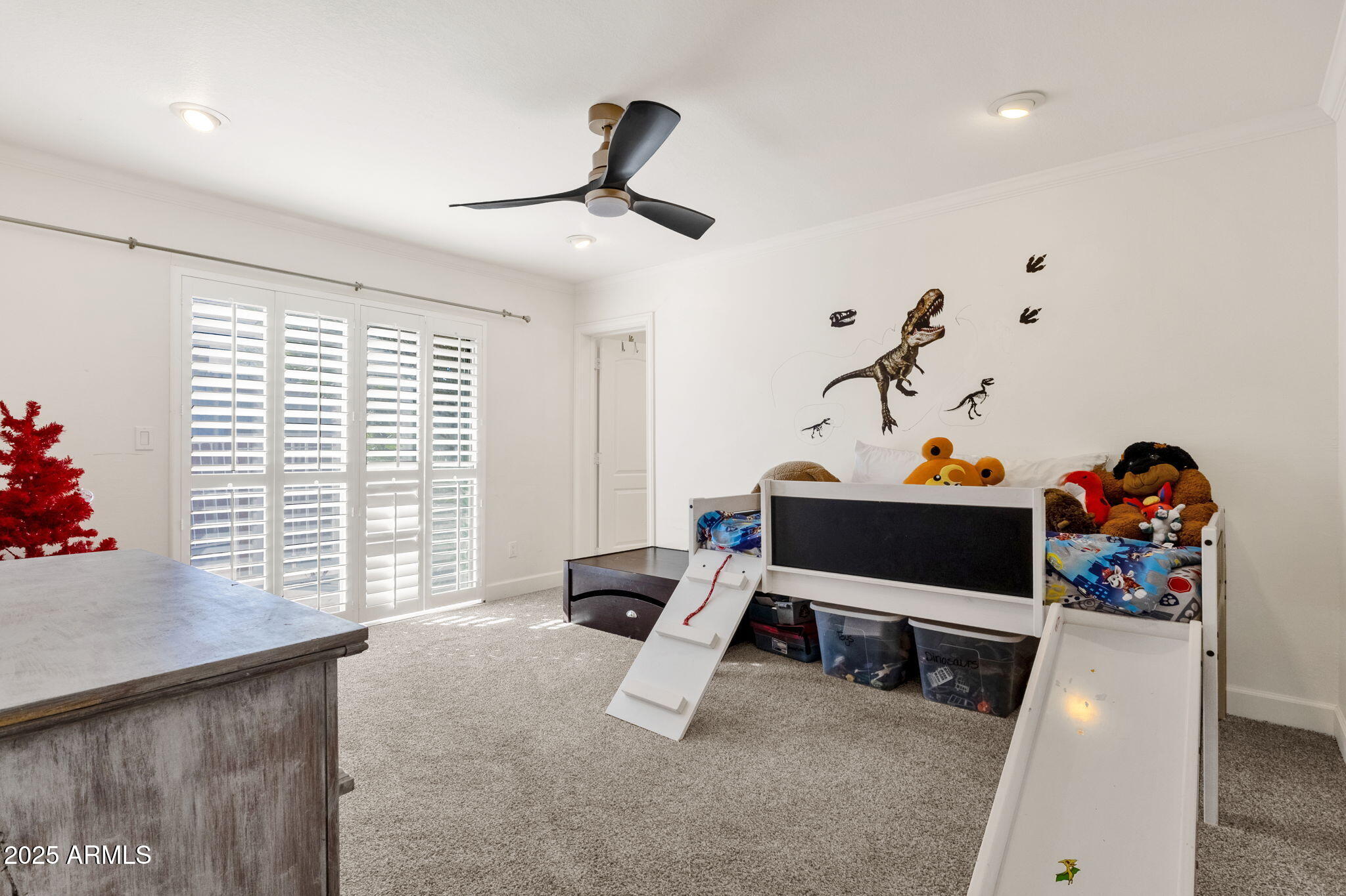 89 North Riata Street Gilbert, AZ 85234 - Photo 29 of 40 a living room with furniture and a flat screen tv