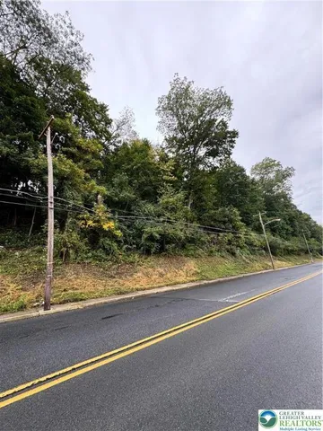 a view of a yard with an outdoor space
