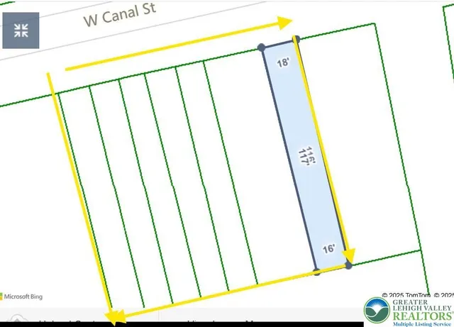 a view of utility room with a sink and a mirror