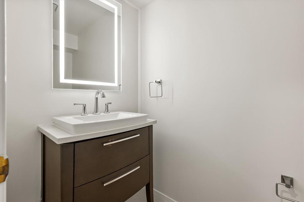 1036 Clinton Street Carrollton, TX 75007 - Photo 23 of 40 Bathroom featuring vanity