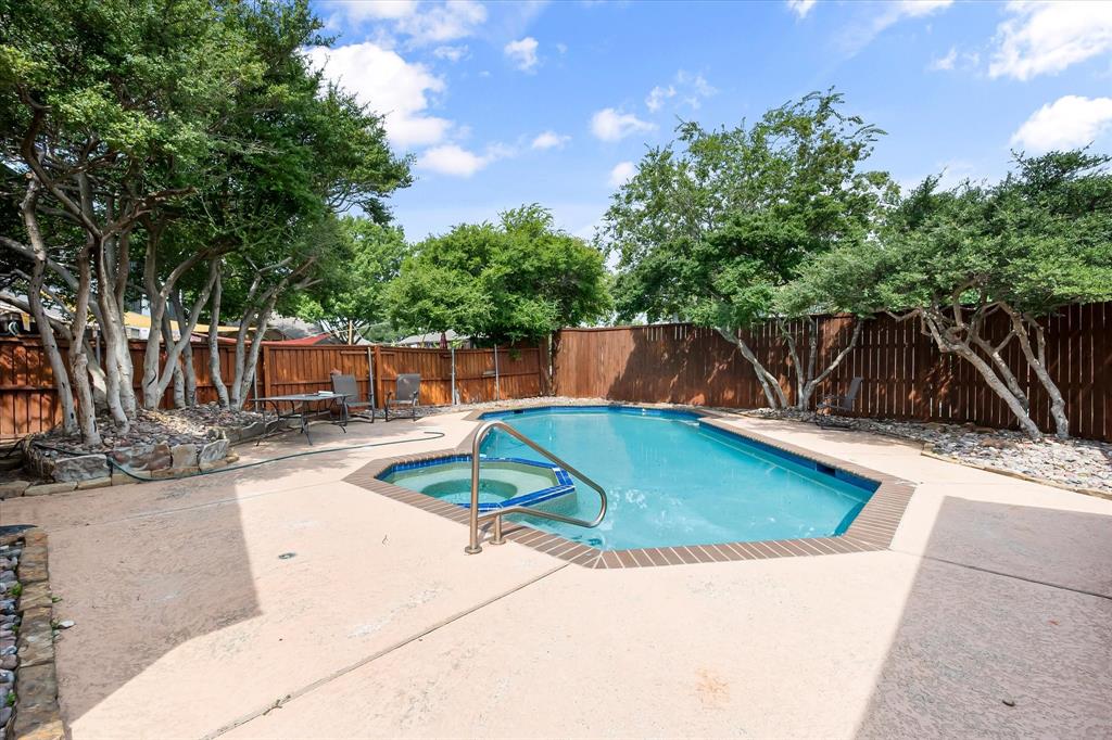 1036 Clinton Street Carrollton, TX 75007 - Photo 33 of 40 View of pool featuring a fenced backyard and a patio area