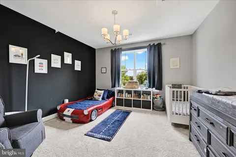 a room with furniture and a wooden floor